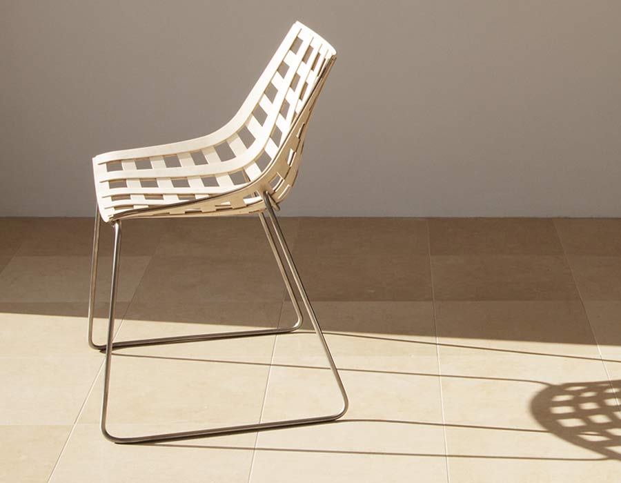 Plywood Chair Global in the sunshine